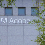 Adobe Shares Drop 12% After Weak Revenue Forecast Raises Concerns Over Delayed AI Returns