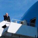 Trump Makes Obscene Gesture at Michigan Factory Heckler as White House Defends His Reaction