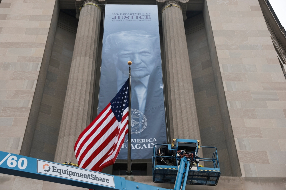 Trump’s Portrait Displayed Outside US Justice Department in Bold Branding Move