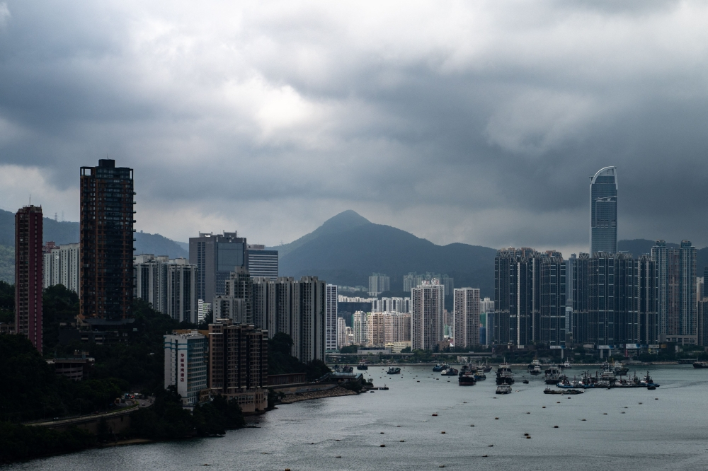 Hong kong raises black rain warning as heavy downpour triggers school closures and flood alerts