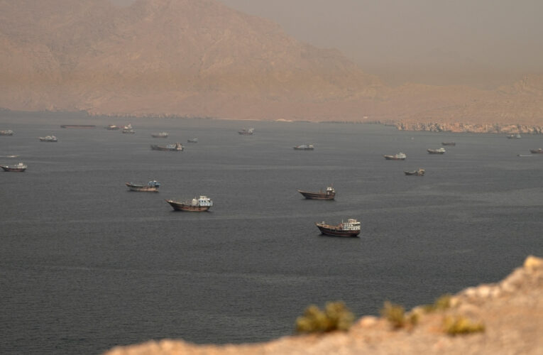 Strait of Hormuz Escort Operations Paused After Commercial Ship Hit in Suspected Attack Near Oman