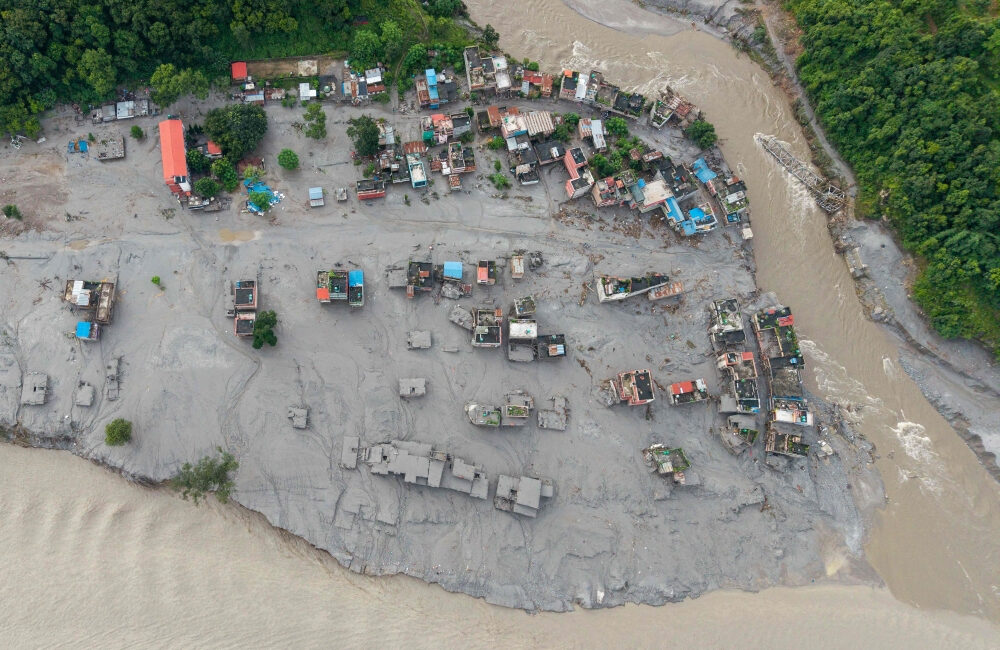 Nepal-Tibet disaster floods, landslides and a growing search for missing victims