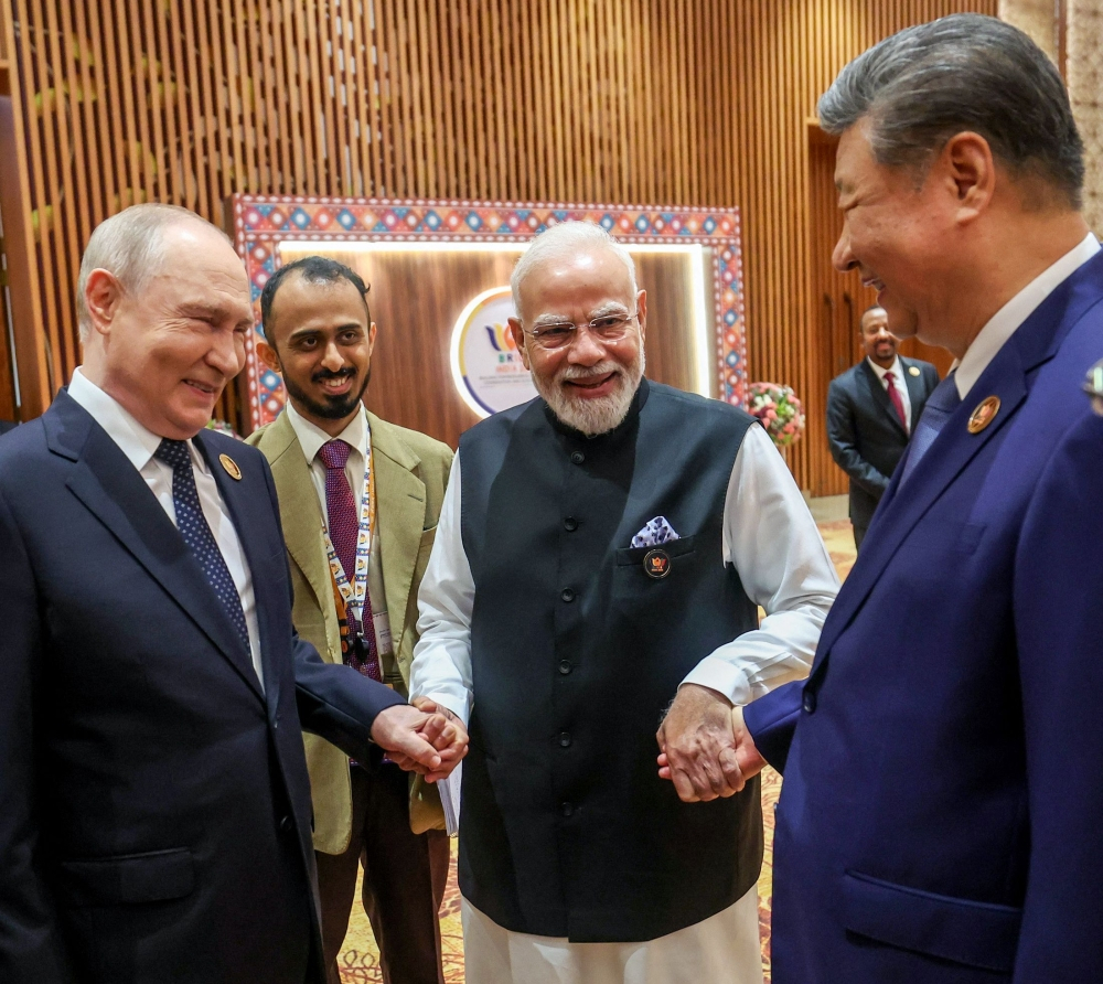 Modi and Xi Call for Peace and Stronger Trade Ties Six Years After Border Clash