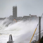 One dead and 60,000 without power as powerful Nor’easter batters US Northeast