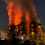 Hong Kong leader apologises for deadly blaze that killed 168 as housing minister resigns