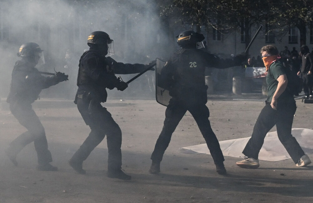 Paris police arrest record 855 people after violent protests and widespread looting