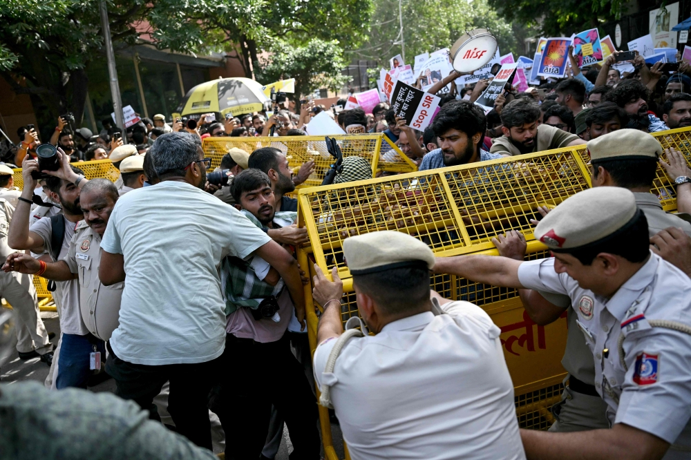Indian police detain dozens of protesters demanding election chief resign over voter-roll irregularities